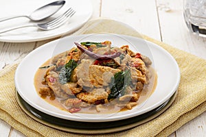 Pad kra pao gai or chicken stir fried with holy basil leaves