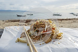 Pad thai or phad thai, is a stir-fried rice noodle dish commonly served as a street food in Thailand