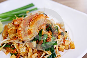 Pad Thai, Stir-fried noodle with shrimp, tofu, bean sprouts and vegetables.