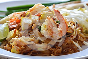 Pad Thai stir fried rice noodle with shrimp and egg on dish