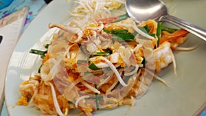 Pad thai on white plate asian cousine