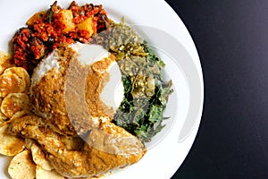 Padang Rice with chicken curry - Nasi Padang photo