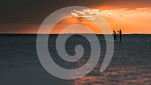 Paddle Boarders at Sunset in Key Largo photo