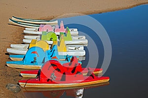 Paddle boats at the side of the lagoon at Ramsgate, Kwazulu Natal.