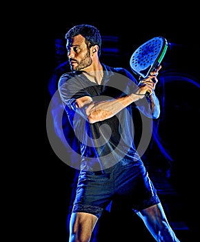 Paddle tennis player man light painting  black background