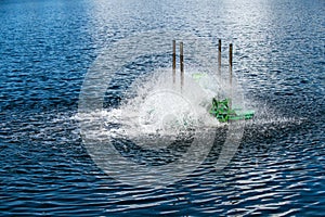 Paddle wheels aerators in lake, waste water treatment by fill oxygen into water