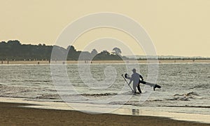 Paddleboarder at Dawn