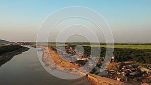 A paddy field in front of Chong Kneas Floating Village on Tonle Sap Lake