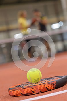Padel racket and ball photo