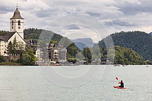 Padling on Wolfgangsee lake. Salzburg region. Austrian mountain landscape