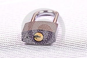 The padlock on the binary code