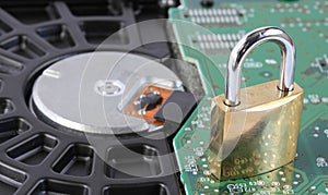 Padlock on computer hard disk drive