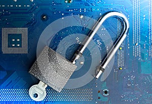 Padlock on the computer motherboard. Data Privacy Information Security Concept