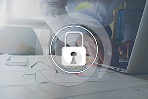 Padlock denoting security on the working in the office on table background
