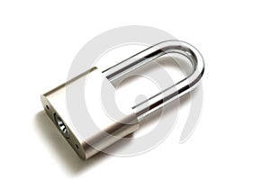 A padlock with elongated hook latch bar against a white backdrop