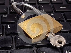 Padlock on keyboard Business background