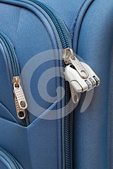 Padlock in modern suitcase