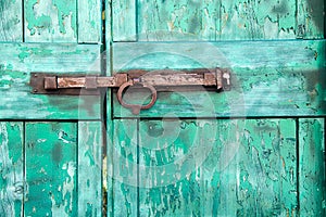 Padlock on old door