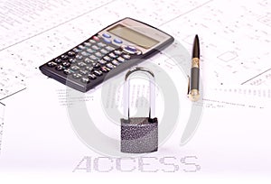 Padlock, pen, calculator