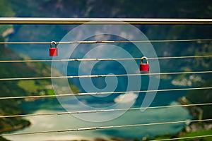 Padlock on rail and fjord view, Norway