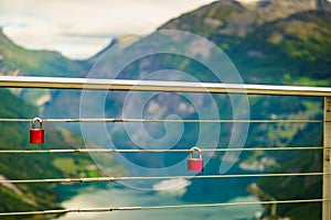 Padlock on rail and fjord view, Norway