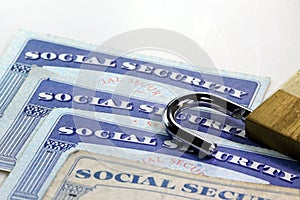 Padlock and social security card - Identity theft and identity protection concept