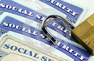 Padlock and social security card - Identity theft and identity protection concept