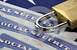 Padlock and social security card - Identity theft and identity protection concept