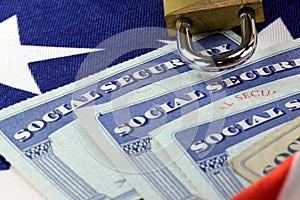 Padlock and social security card - Identity theft and identity protection concept