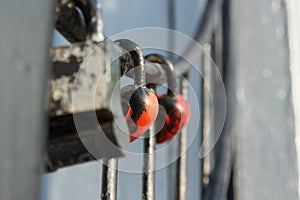 Padlocked on metal rods concrete the structure