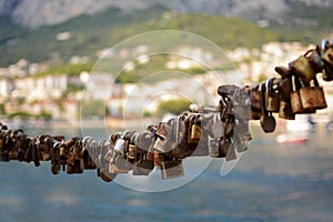 Padlocks as symbol of eternal love, valentine day hanging on chain