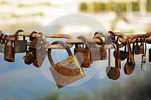 Padlocks as symbol of eternal love, valentine day hanging on chain