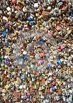 Padlocks hanging from a fence showing lifetime love and commitment