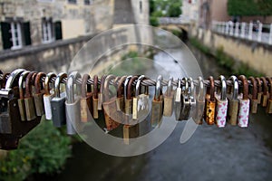 Padlocks, love lock on a bridge as a sign of connection