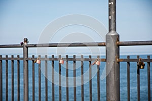 Padlocks on the railings at the pier in Miedzyzdroje. poland