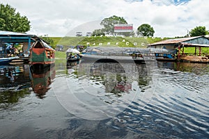 PADRE COCHA, Peru View of river port in village Padre Cocha near Iquitos, Peru. photo