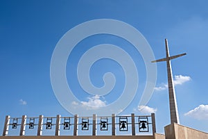 The Padre Pio Shrine at Santa Maria delle Grazie in San Giovanni Rotondo, Italy designed by Renzo Piano. Photo shows bells, cross