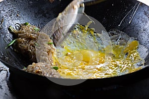 Padthai is being stir-fried photo