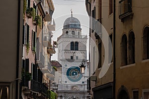 Padua - Street view on the astronomical clock tower on Piazza dei Signori in Padua, Veneto, Italy