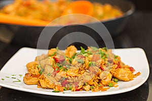 Paella on a plate, still steaming