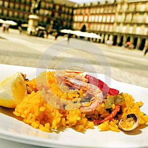 Paella in Plaza Mayor in Madrid, Spain photo