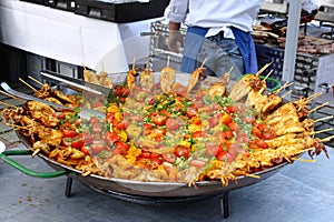 Paella prepared in a giant pan, at a big Silvester party photo