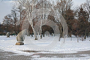 Pagan carved stones in bright winter day, Chernihiv