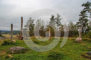 Pagan idols in autumn forest, Karelia