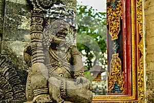 Pagan sculpture - traditional Balinese God statue in Hindu temple