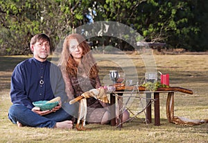 Pagans with Smudge Stick and Altar