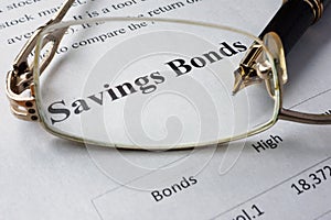 Page of newspaper with words savings bonds.