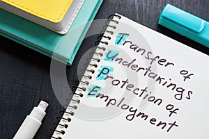 Page with words TUPE Transfer of Undertakings Protection of Employment Regulations.