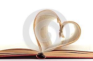 Pages of a book curved into heart