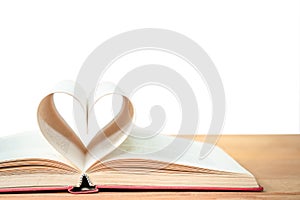 Pages of book curved heart shape